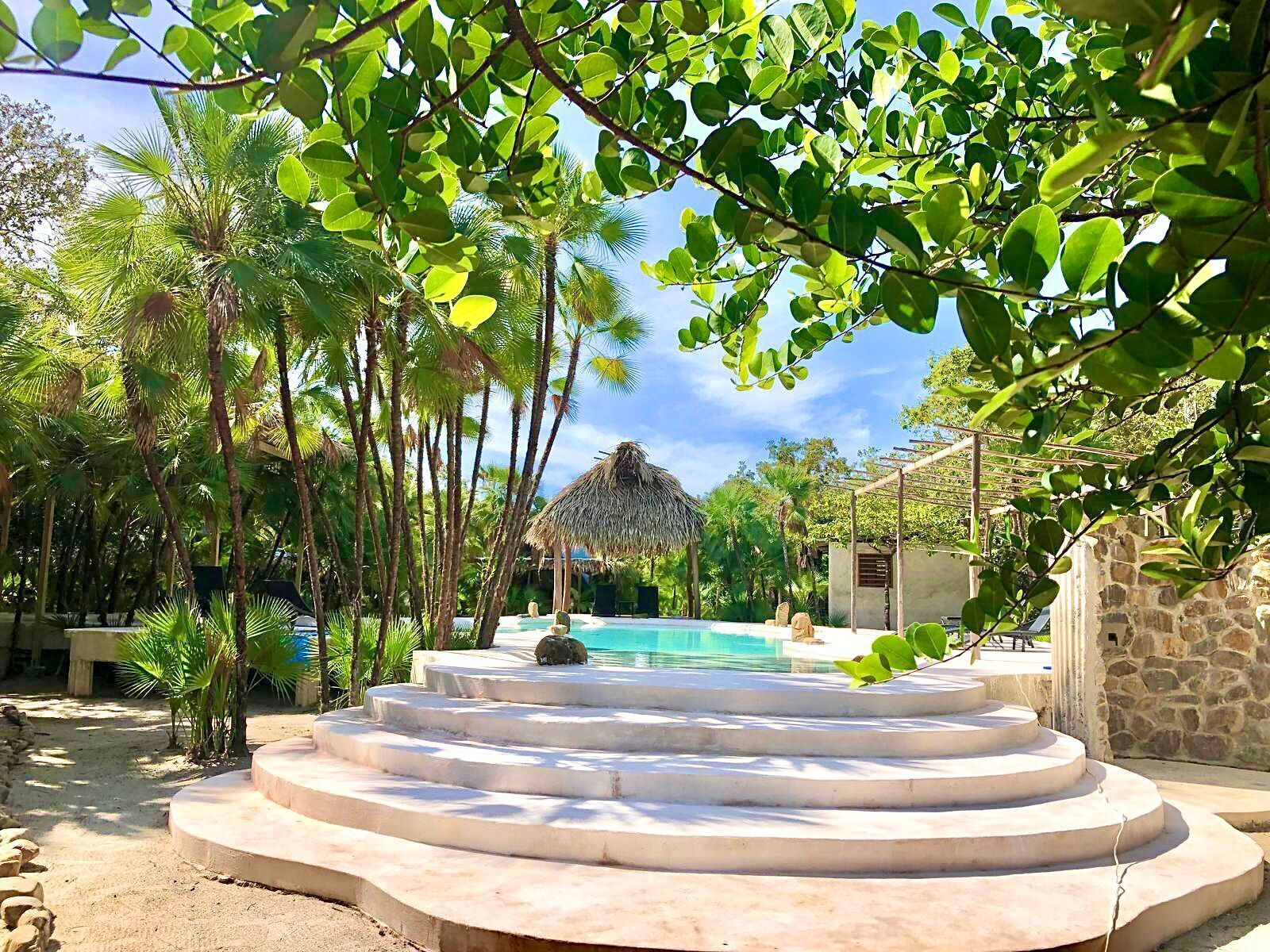 Outdoor pool, open 7:00 AM to 10:00 AM, free pool cabanas