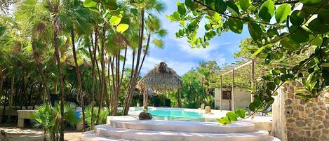 Outdoor pool, open 7:00 AM to 10:00 AM, free cabanas, pool umbrellas