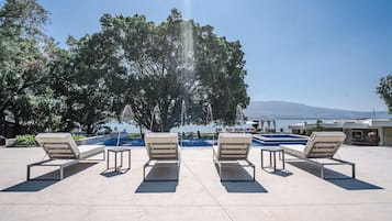 Outdoor pool, open 8:00 AM to 10:00 PM, pool umbrellas, pool loungers