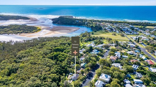 Nestled in the heart of the serene seaside village of Red Rock.