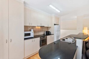 Coffee/tea maker, fridge, microwave, stovetop