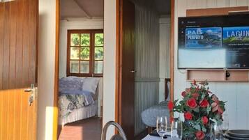 Refúgio Farol Ponta do Catalão - Bela Vista Vista 3 - Imbituba - SC | Zona de estar | Una Smart TV, Netflix, películas de pago, servicios de streaming