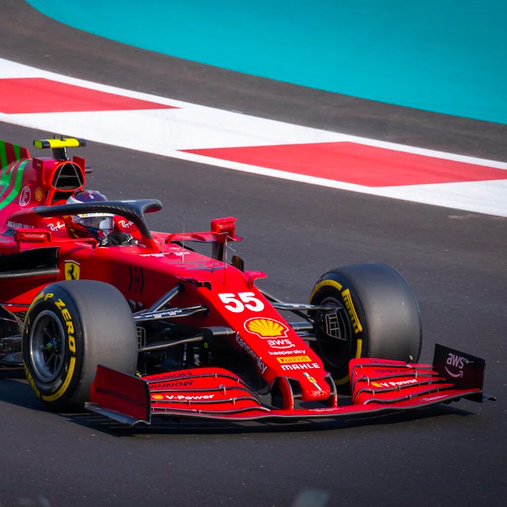 A red race car with the number 55 on the front.