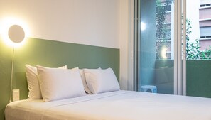 Estúdio executivo | 1 quarto, escrivaninha, Wi-Fi de cortesia, roupa de cama