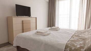 1 dormitorio, tabla de planchar con plancha, wifi gratis y ropa de cama