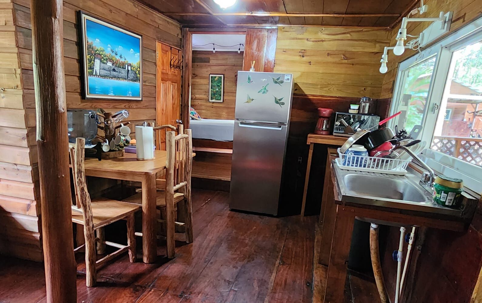 Fridge, stovetop, coffee/tea maker, cookware/dishes/utensils