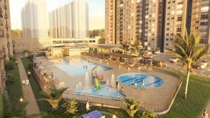 A residential complex with high-rise buildings, a central courtyard with a swimming pool, and a tennis court. - Apartamentos Mirador - by SOHO (Puerto Colombia)