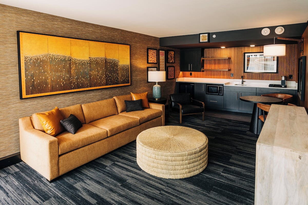Suite, 1 King Bed (Mash Bill Suite Accessible) | Living area | 50-inch flat-screen TV with cable channels