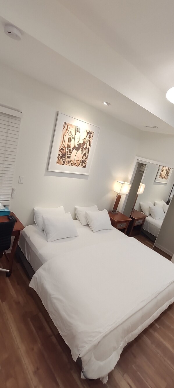 1 bedroom, desk, iron/ironing board, travel cot