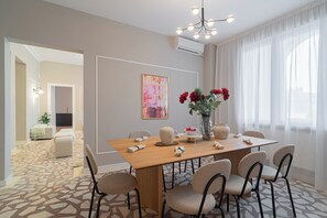 Deluxe Apartment, 4 Bedrooms, Balcony, City View | Living area - Loggia & Luxe 4BR Penthouse in Universitatii Area (Bucharest)