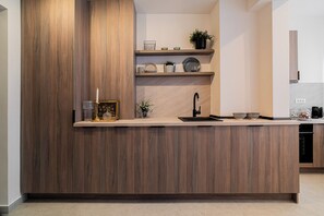 Deluxe Apartment, 4 Bedrooms, Balcony, City View | Private kitchen | Coffee/tea maker, electric kettle