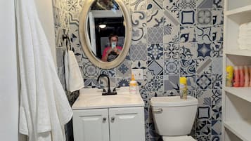 Hair dryer, towels, soap, toilet paper