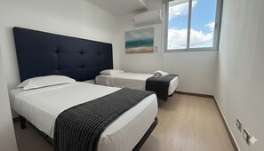 3 habitaciones, tabla de planchar con plancha, wifi y ropa de cama 