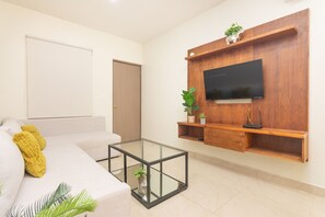 TV, fireplace, offices - Luxury 2BR with Balcony, Direct Access to 5th Ave (Playa del Carmen)
