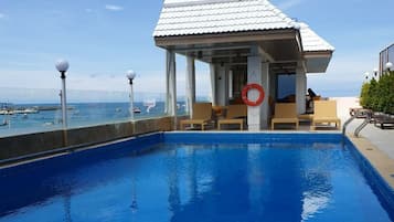 Outdoor pool, pool umbrellas, pool loungers