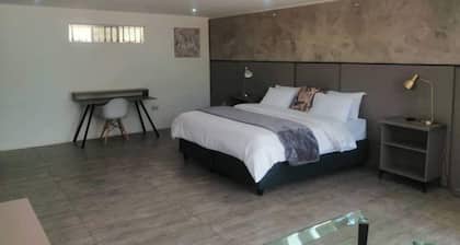Room 1 of 8 Cozy Suites at The Hilltop Guesthouse