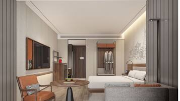 Minibar (inkludert), safe på rommet, blendingsgardiner og lydisolert