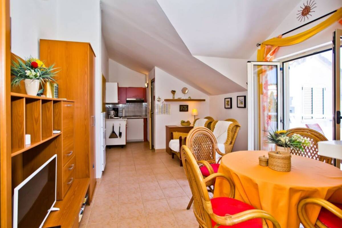Apartment (One Bedroom Apartment with Balcony) | Living room | 32-inch flat-screen TV with satellite channels