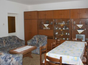 Apartment (Classic Four Bedroom Apartment with S) | Living room | 32-inch flat-screen TV with cable channels