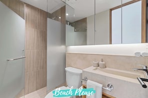 Shower, hair dryer, towels, shampoo