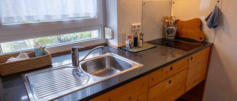 Fridge, stovetop, electric kettle, toaster