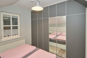 2 quartos, Wi-Fi de cortesia, roupa de cama