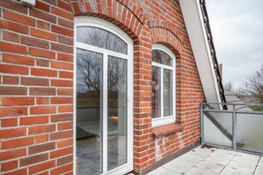 Exterior detail - Apartment 'Wohnung Gold' with balkon, Shared Garden and Wi-Fi (Süderdeich)