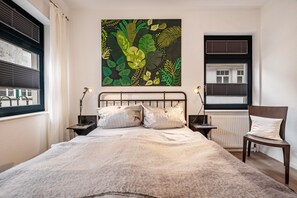 1 habitación, tabla de planchar con plancha, wifi gratis y ropa de cama 