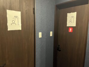 Hair dryer, slippers, towels, shampoo