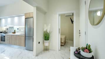 Luxury Apartment, City View | Private kitchen | Full-sized fridge, oven, stovetop, espresso maker