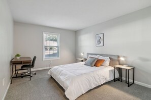 1 bedroom, desk, iron/ironing board, travel cot