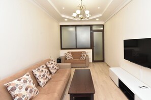 Deluxe Apartment, City View | 2 bedrooms, blackout drapes, iron/ironing board, free WiFi