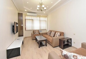 Deluxe Apartment, City View | 2 bedrooms, blackout drapes, iron/ironing board, free WiFi