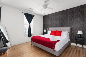 1 bedroom, desk, iron/ironing board, travel crib