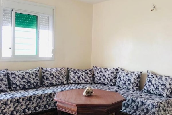 Apartment, City View | Living area | Flat-screen TV