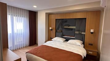 Comfort Quadruple Room, Non Smoking, Balcony | Bathroom | Shower, hair dryer, towels, soap