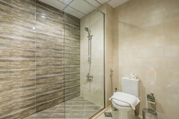 Shower, hair dryer, towels, soap