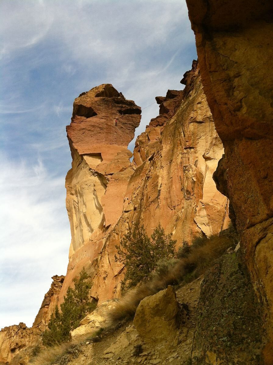 A natural rock formation with a clear sky.