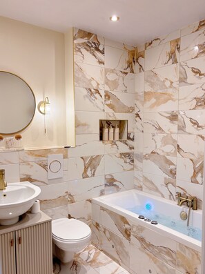 Shower, jetted tub, hair dryer, towels