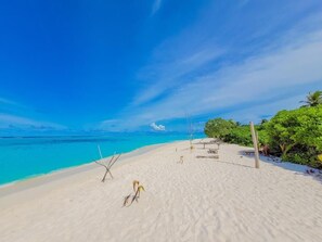 Private beach nearby, white sand