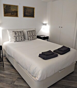 1 bedroom, desk, iron/ironing board, bed sheets