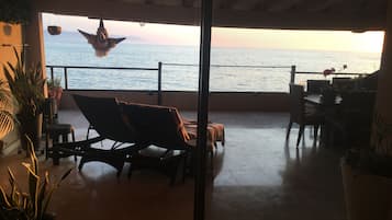 Deluxe Suite, 1 King Bed, Non Smoking, Ocean View | Terrace/patio