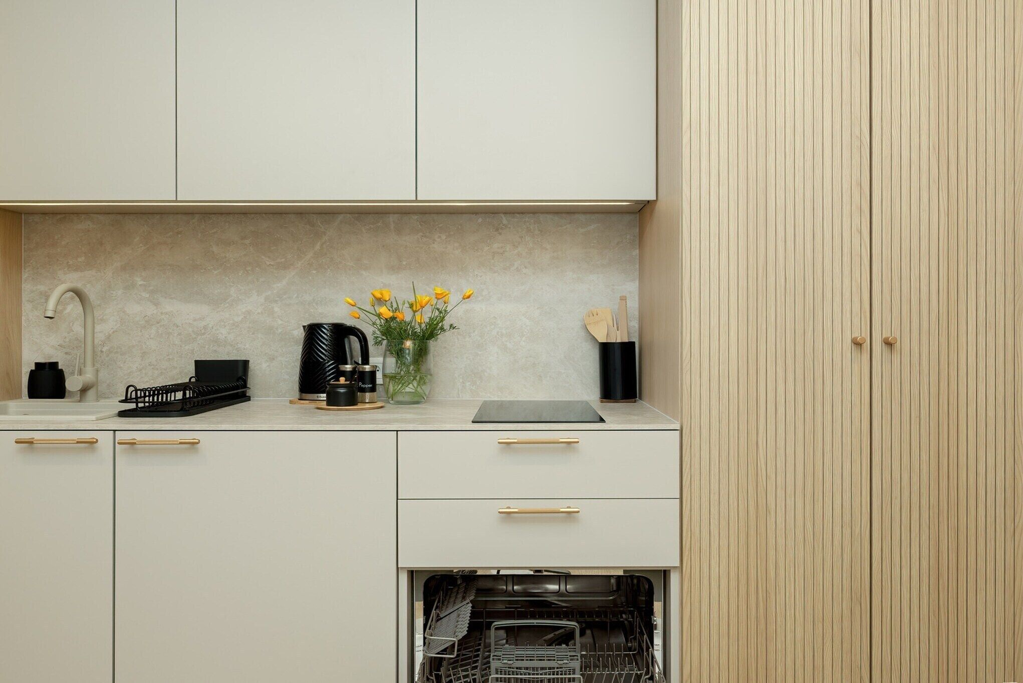 Coffee/tea maker, fridge, stovetop, dishwasher