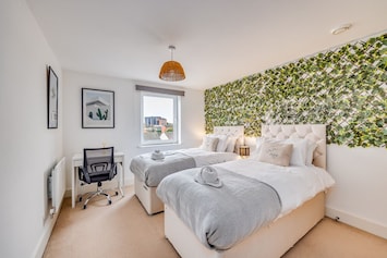 The master bedroom has a comfortable zip link bed configured as two single beds by default or can be zipped together upon request.