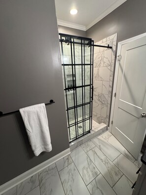 Shower, hair dryer, towels, soap