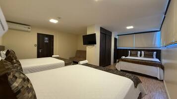 Family Triple Room, Mixed Dorm | Desk, iron/ironing board, free WiFi, bed sheets