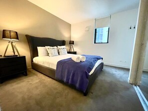 2 bedrooms, desk, iron/ironing board, travel crib