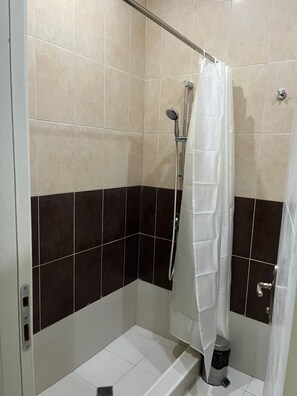 Double or Twin Room | Bathroom | Hair dryer, towels, soap, shampoo - NightCentral (Tbilisi)