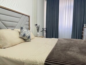 Family Condo, City View | 3 bedrooms, blackout drapes, iron/ironing board, free WiFi - New Kamolon by RNB estate (Tashkent)