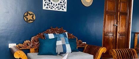 Deluxe House, City View | Living area | Flat-screen TV